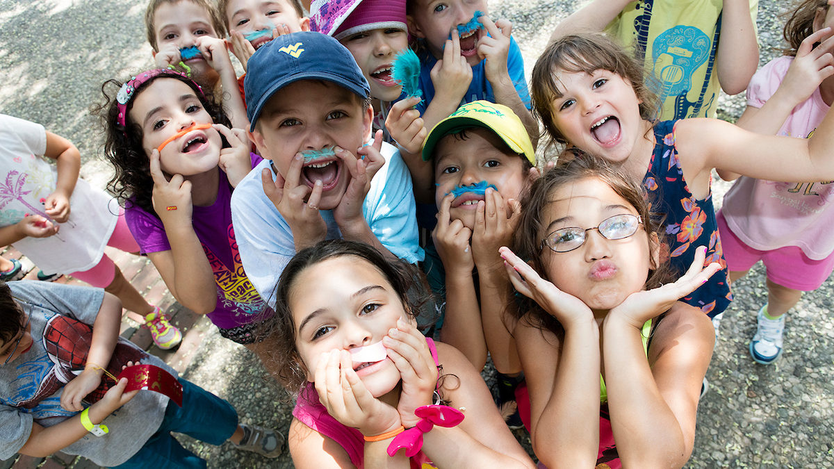 poly summer camp campers on campus