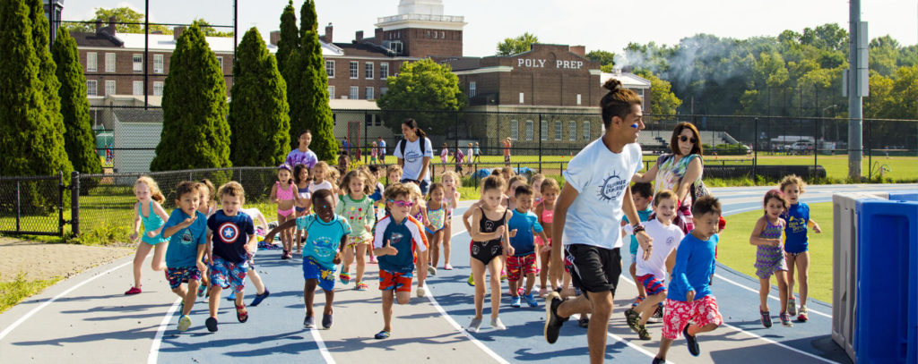 Poly Summer campers running on track